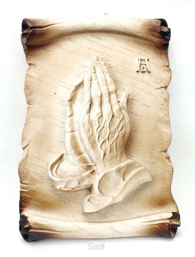 Wandvoorstelling biddende handen