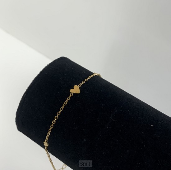 Armband drie hartjes goud